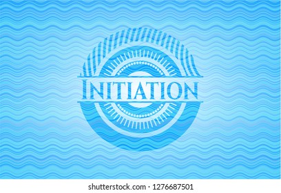 Initiation light blue water wave style emblem.