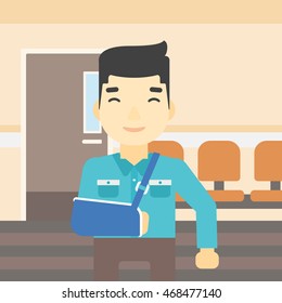 An injured asian man with broken right arm in brace standing in the hospital corridor. Smiling man wearing an arm brace. Vector flat design illustration. Square layout.