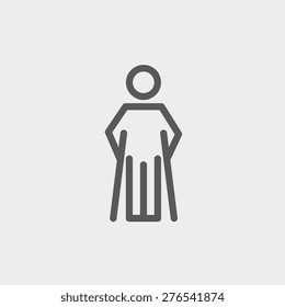 Injured man with crutches icon thin line for web and mobile, modern minimalistic flat design. Vector dark grey icon on light grey background.