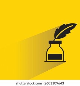 ink bottle and feather with shadow yellow background