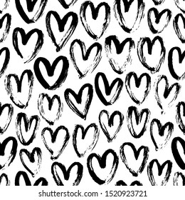 Ink brush hearts hand drawn seamless pattern. Romantic figures vector illustration. Monochrome freehand dry paint brush stroke shapes. Decorative textile, wallpaper, wrapping paper, textile design