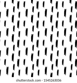 Ink brush strokes and lines. Grunge doodle brushes on white backdraund. Abstract seamless vector pattern.