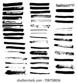 Ink brush strokes set isolated on white background. Grunge ink strips. Set of vector black paint brush spots for you design.