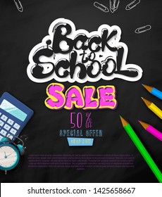 Ink flowing in lettering form Back to school. Sale. Topographic Banner with pencils, paperclips, clock and calculator on the background of the texture of the school board.