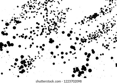 Ink grunge drops texture. Black hand drawn splashes and stains on white background.