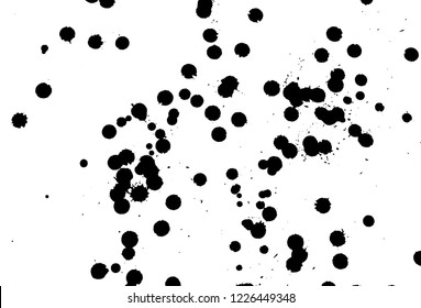 Ink grunge drops texture. Black hand drawn splashes and stains on white background.