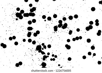 Ink grunge drops texture. Black hand drawn splashes and stains on white background.