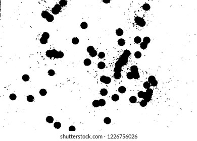 Ink grunge drops texture. Black hand drawn splashes and stains on white background.