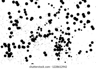 Ink grunge drops texture. Black hand drawn splashes and stains on white background.