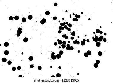 Ink grunge drops texture. Black hand drawn splashes and stains on white background.