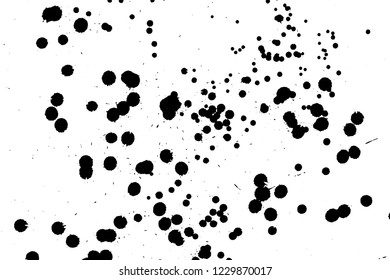 Ink grunge drops texture. Black hand drawn splashes and stains on white background.