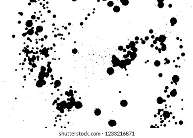 Ink grunge drops texture. Black hand drawn splashes and stains on white background.