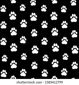 Ink hand drawn seamless pattern with dog paws traces