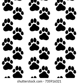 Ink hand drawn seamless pattern with dog paws