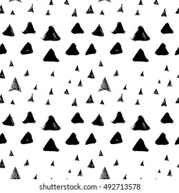 Ink hand drawn triangles. Seamless pattern.