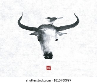 Ink painting of little bird on bull's head, chinese new year symbol of 2021 on vintage textured rice paper. Translation of hieroglyph - zen.
