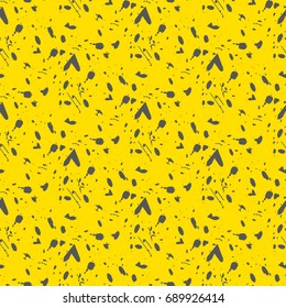 Ink splashes seamless pattern. Abstract background in grunge style.Yellow and black