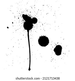 manchas de tinta hechas por tinta que cae desde una altura. 
Manchas negras sobre un fondo blanco. Tres grandes puntos y muchos pequeños.
