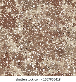 Ink spots and stains on a light brown natural view background.