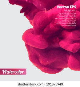 Ink swirling in water pink background