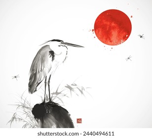 Ink wash painting with big red sun over a heron standing among reeds and dragonflies in flight. Traditional oriental ink painting sumi-e, u-sin, go-hua. Translation of hieroglyph - good luck.