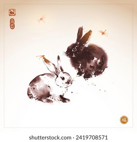 Pintura de lavado de tinta de conejos y libélulas al estilo vintage. Tinta oriental tradicional sumi-e, u-sin, go-hua. Hieroglífico - bienestar.