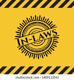 In-laws black grunge emblem, yellow warning sign. Vector Illustration. Detailed.