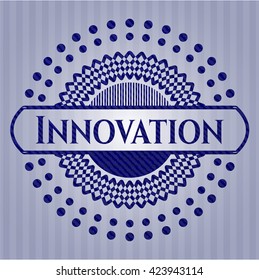 Emblema de innovación con fondo jean