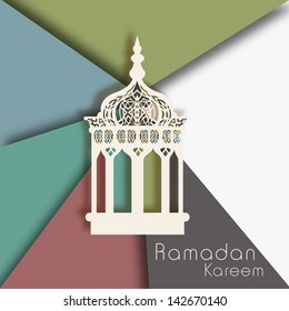 Inricate Arabic lamp on colorful background for holy month of Ramadan Kareem background.