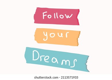 the inscription "follow your dream" on pieces of paper tape. Motivation lettering