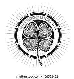 The inscription "good luck" with a beautiful clover doodle. Template for t-shirts, cafe , club, or your design.
