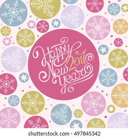 The inscription Happy New Year 2017. Hand calligraphy. Colourful vector image in the form of abstract snowflakes and confetti. Template for greeting cards, banners, invitations.