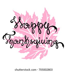 The inscription of a happy Thanksgiving day on a maple leaf