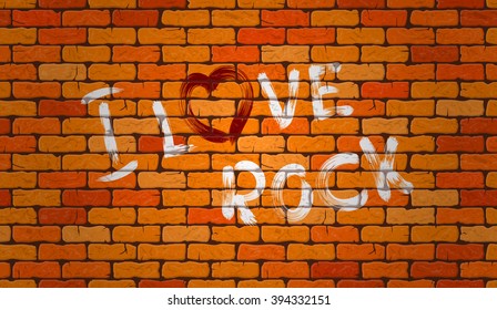 Inscription I love rock on the wall of red brick