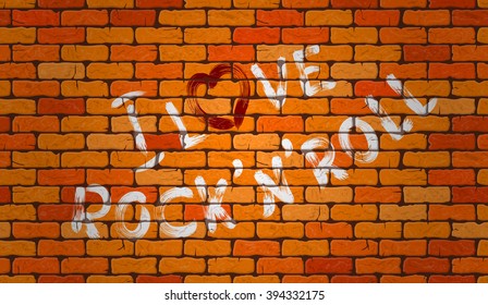 Inscription I love rock'n'roll on the wall of red brick