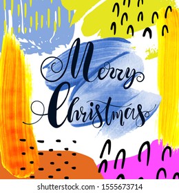  Inscription Merry Christmas on an abstract background from bright strokes of paint