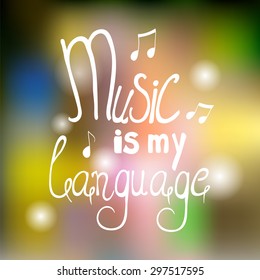 Inscription "Music is my language" on abstract blurred vector background