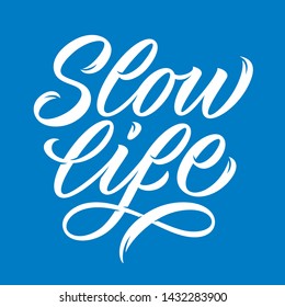 inscription slow life on blue background, calligraphy, lettering
