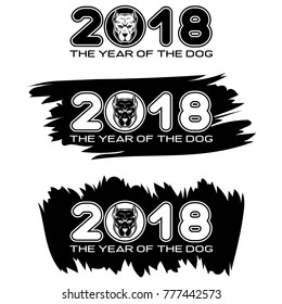 Inscription the year of the dog and 2018 with dog head on black paint stain. Design for greeting card, poster, banner and flyers.