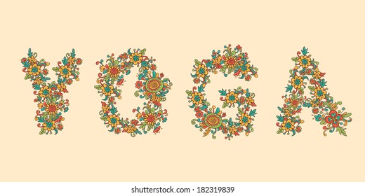 Inscription " YOGA" made from flowers.