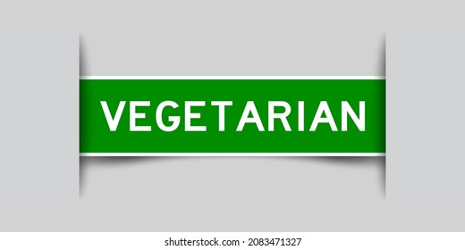 Inserted green color label sticker with word vegetarian on gray background