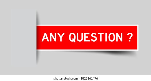 Inserted red color label sticker with word any question on gray background