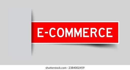 Etiqueta de color rojo insertada pegatina con la palabra comercio electrónico sobre fondo gris