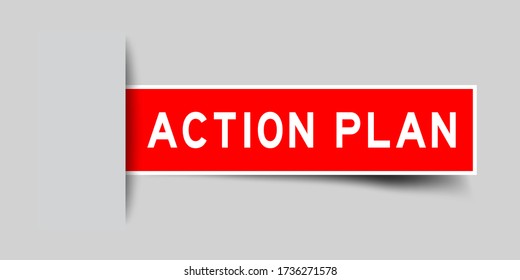 Inserted red color sticker label with word action plan on gray background