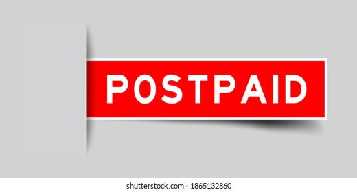 Inserted red color sticker label with word postpaid on gray background