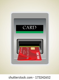 Inserting credit card into bank machine to withdraw money.