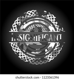 Insignificant grey camouflaged emblem