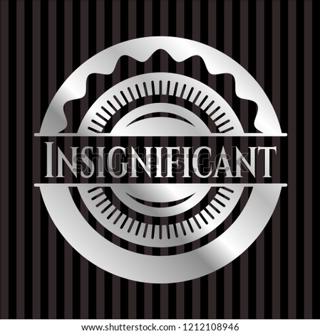 Insignificant silver badge or emblem