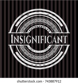 Insignificant silvery shiny badge