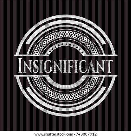 Insignificant silvery shiny badge